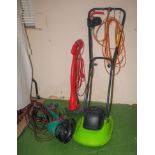 A flymo electric mower and two strimmers