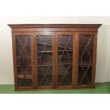 Edwardian lattice four door bookcase with dog tooth moulding, 195cm wide x 38cm deep x 145cm tall