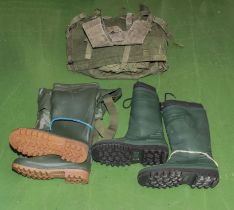 A pair of waders and wellingtons size 8 and a fishing vest