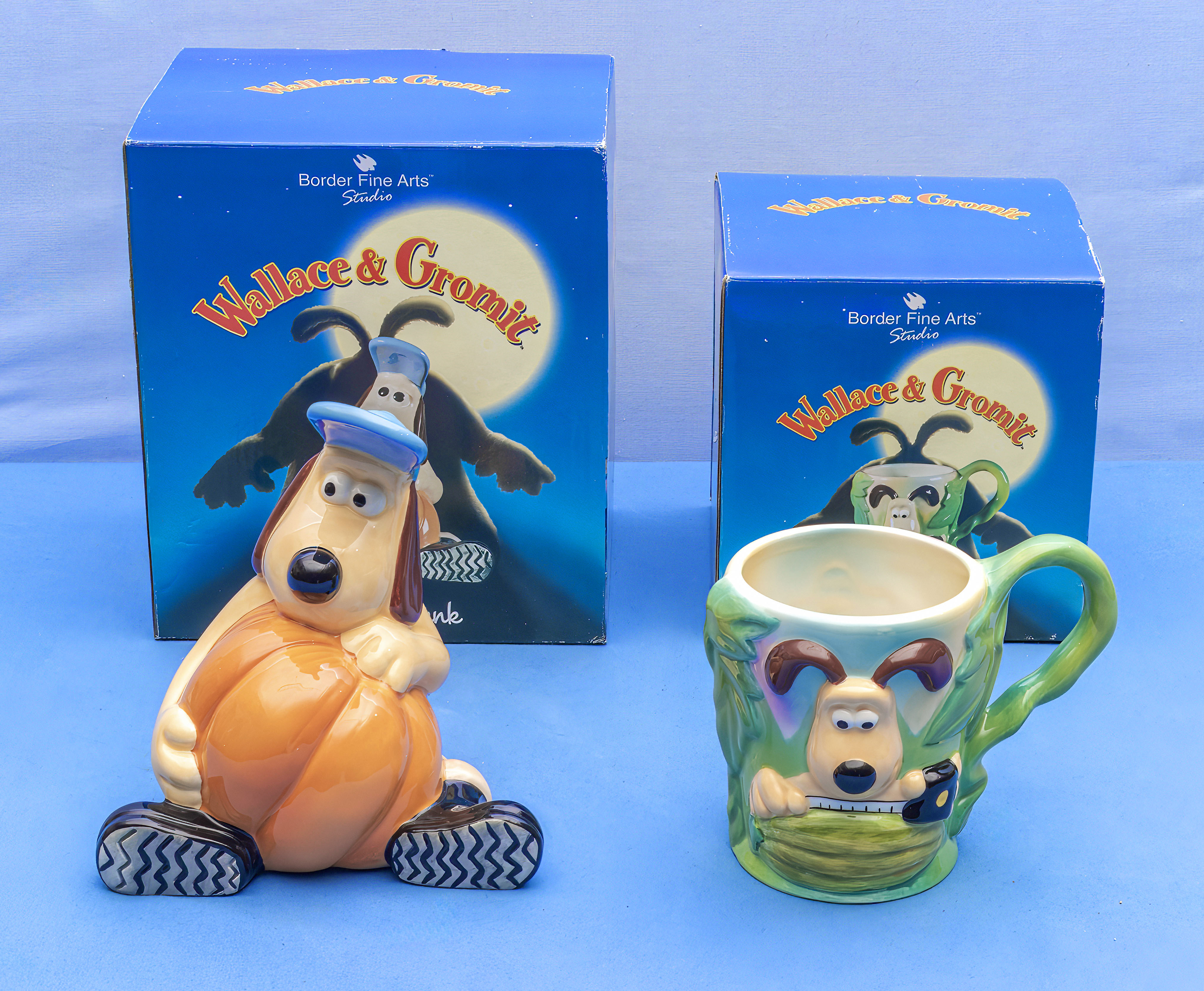 Wallace and Gromit Border Fine Arts money box and a mug original boxes