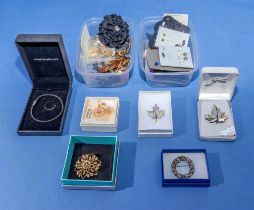 Collection of vintage earrings and brooches