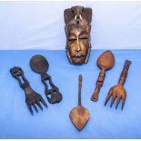 Vintage African carved hardwood salad spoons and forks and a wall mask