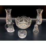 Two crystal glass vases, a bowl, bell and sugar and cream