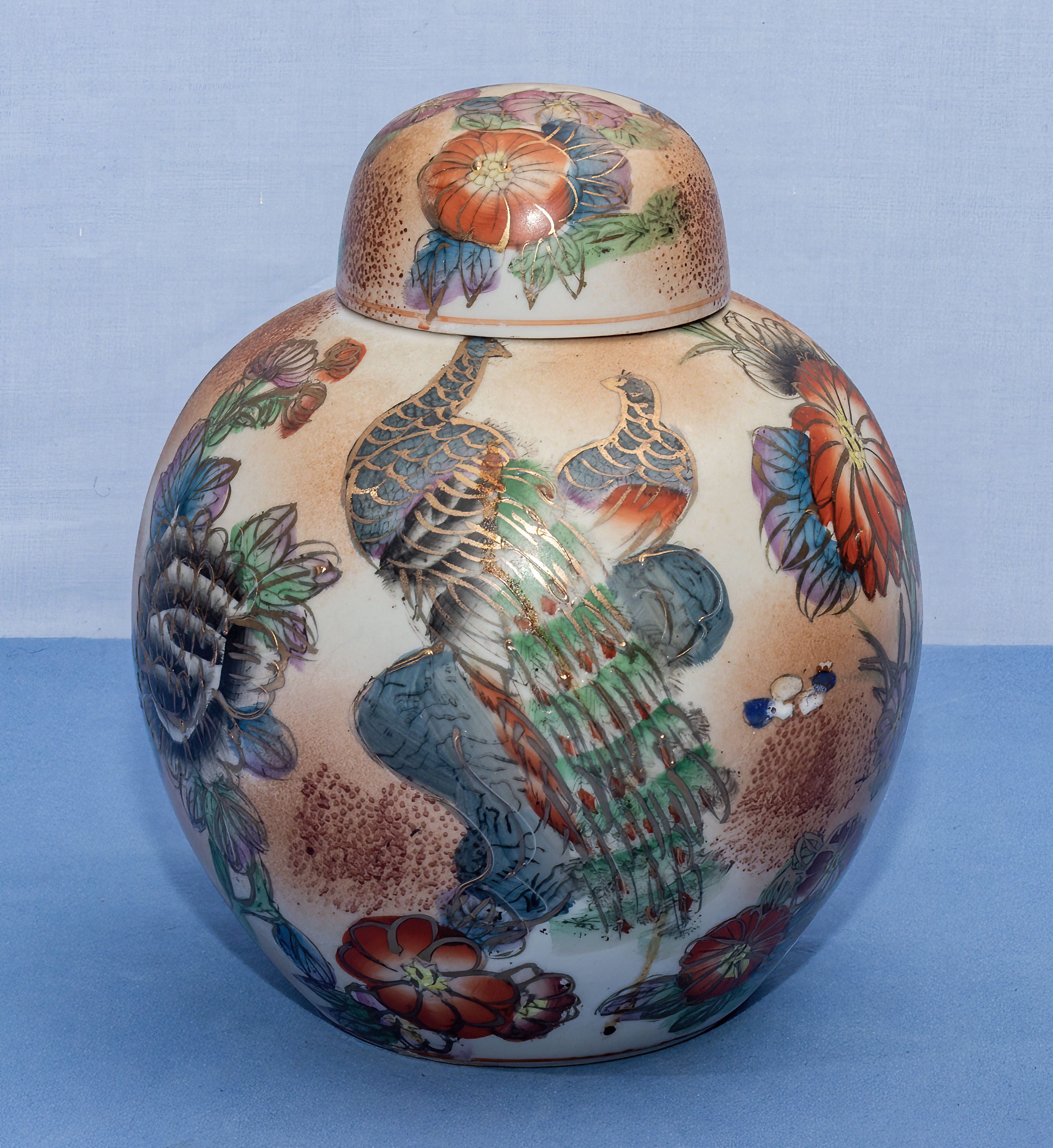 Oriental ginger jar decorated with exotic birds 20cm tall