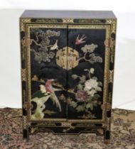 Chinese black lacquer heavily decorated marriage chest with mother of pearl flowers and birds ,