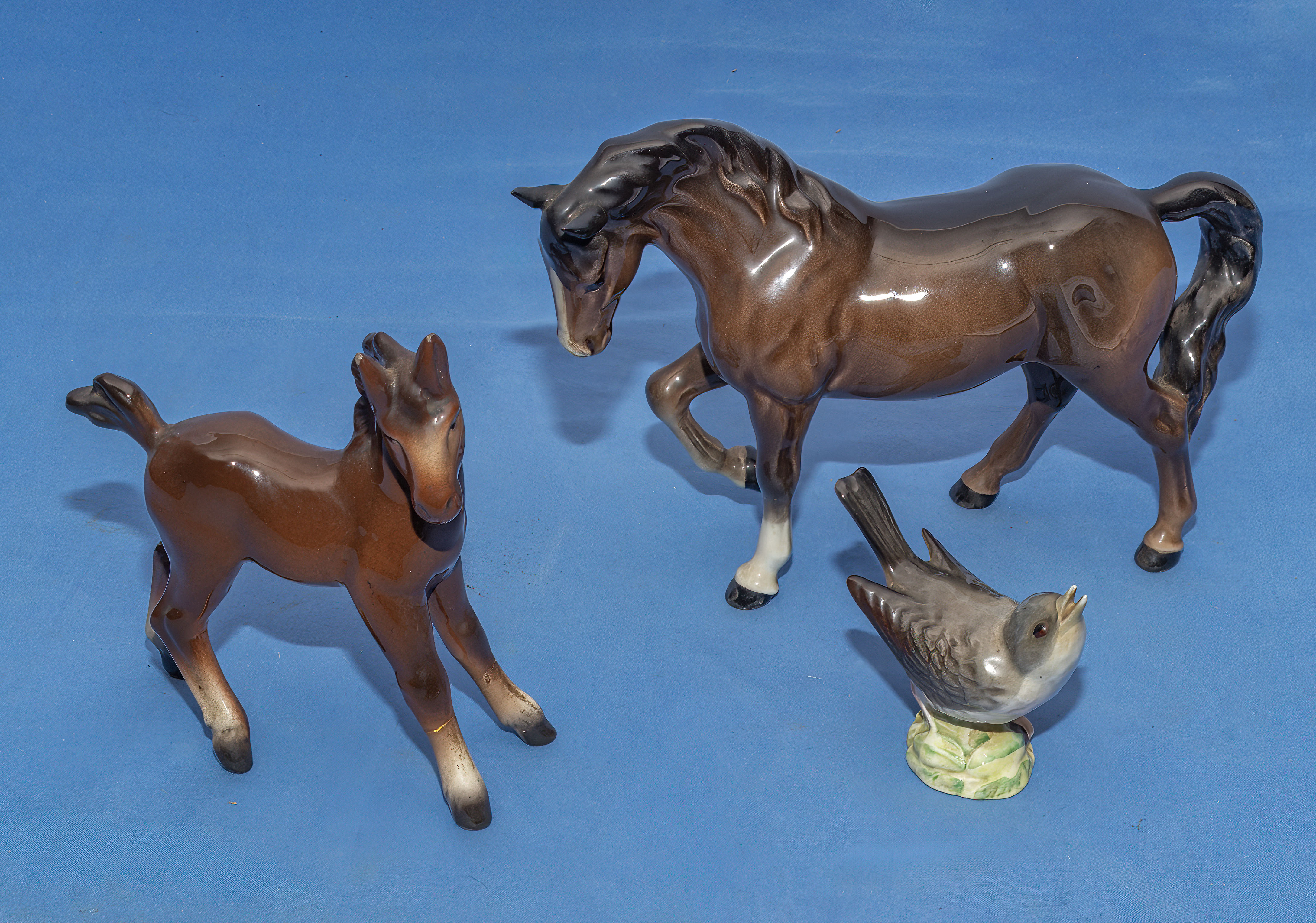 Two Beswick ponies and a wren