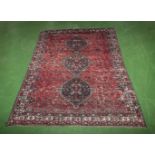 A large red ground Kilim carpet 2.9m x 2m