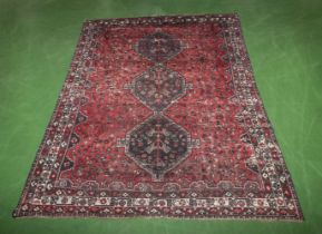 A large red ground Kilim carpet 2.9m x 2m