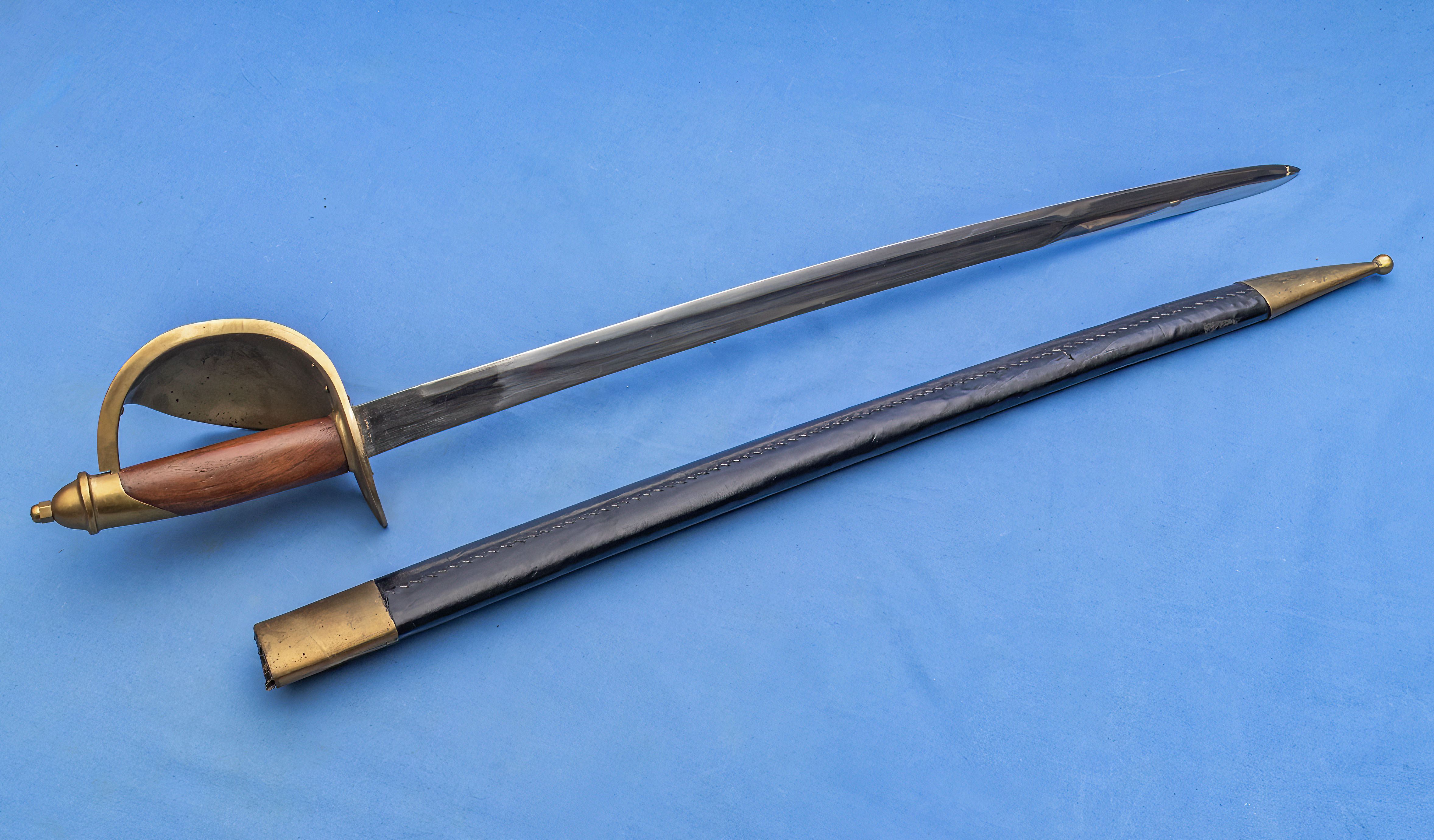 A replica Naval cutlass with black leather scabbard - Image 2 of 6