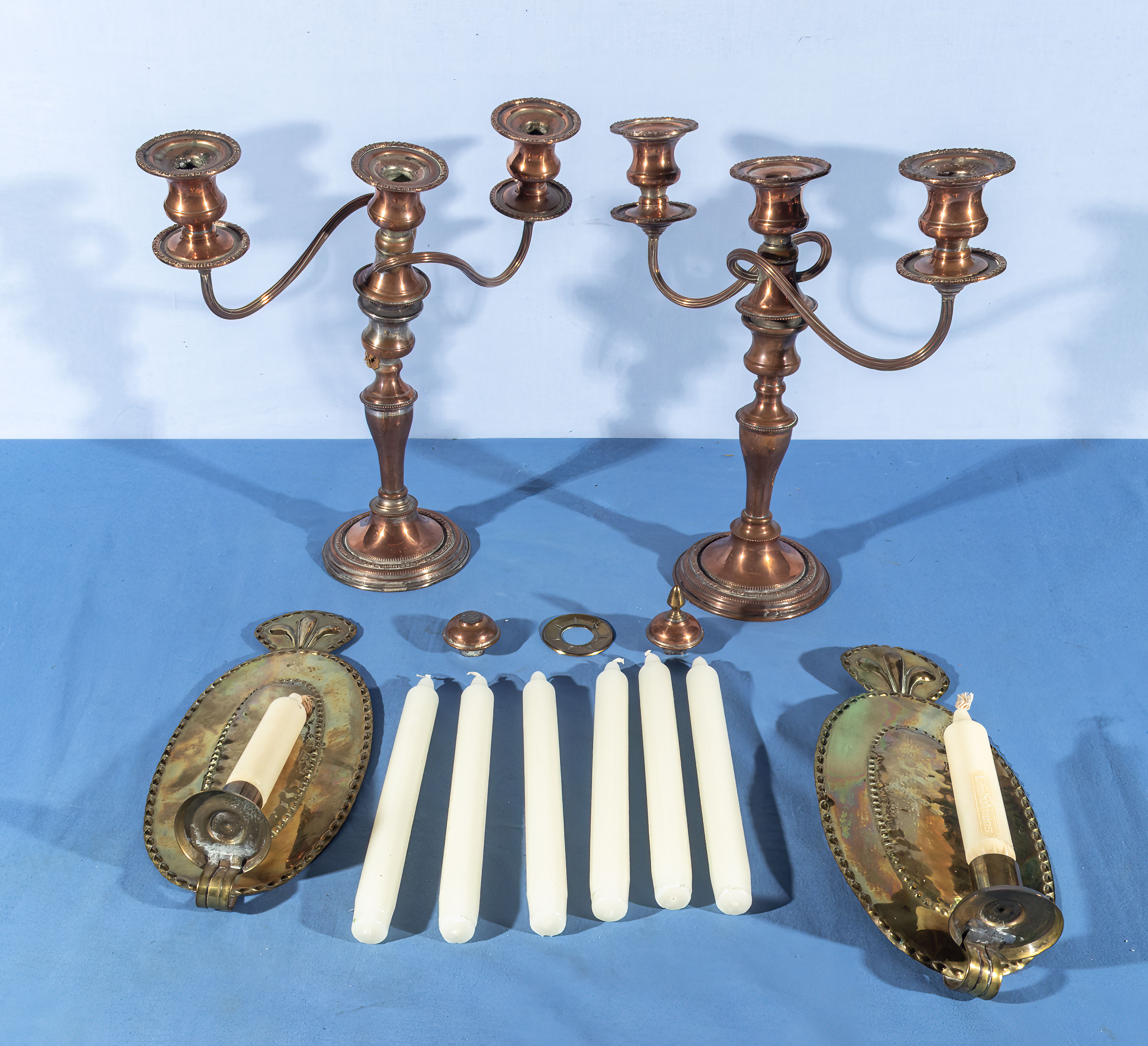 A pair of brass wall sconce and a pair of candelabra A/F