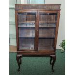 A mahogany display cabinet 76cm wide x 134cm tall x 26cm deep