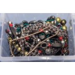 Box of vintage costume jewellery chains and necklaces