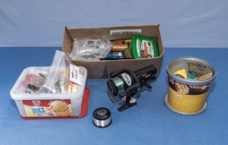 Intrepid fishing reel with spool and three boxes of assorted fishing tackle