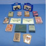 Packs of vintage playing cards and other items