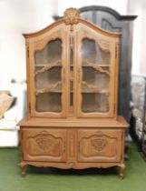 20th century carved oak display cabinet on cupboards, 1.95m tall x 1.26m wide x 50cm deep