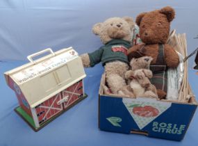 Vintage Fisher Price house and a box of plush toys