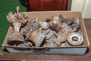 A box containing two Victorian alabaster lamps, in need of restoration