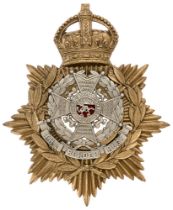 Badge. Border Regiment helmet plate circa 1901-14. Good scarce die-stamped brass crowned star