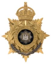 Badge. East Surrey Regiment Officer's helmet plate circa 1901-14. Fine gilt crowned star mounted