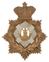 Royal Scots Victorian helmet plate badge circa 1889-1901. Good scarce die-stamped brass crowned star