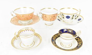 A small group of 19th century English porcelain cups and saucers, comprising a Worcester Flight Barr