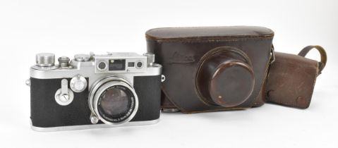 A cased Leica DBP No. 969911 camera with Ernst Leitz GmbH Wetzlar Summicron F=5cm 1:2 lens (No