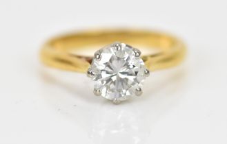 An 18ct yellow gold and diamond solitaire engagement ring, the brilliant cut stone in an eight