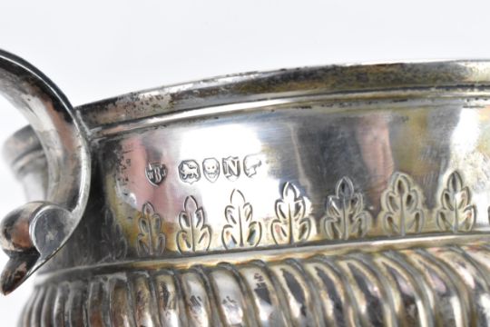 A large Victorian silver twin-handled centrepiece by Walter & John Barnard, London 1888, retailed by - Image 4 of 7