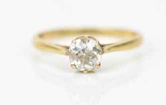 A 9ct gold and solitaire diamond ring, the brilliant cut stone in an eight claw setting, stone