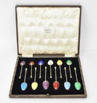 A cased set of Elizabeth II silver-gilt and enamel coffee spoons by Barker Brothers Silver Ltd,