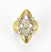 An 18ct yellow gold, platinum and diamond dress ring, set with nine diamond pattern brilliant cut