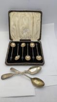 A set of six coffee bean terminal spoons and two silver teaspoons, total weight 76.3g Location: