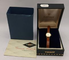 A ladies Tissot gold plated manual wind wristwatch, with original box and paperwork Location: