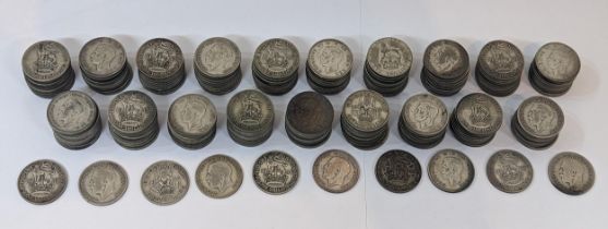 British coins - a quantity of 200 pre-1947 mixed George V and George VI shillings, various dates