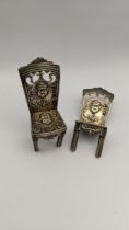 A pair of silver miniature chairs one A/F 31g Location: