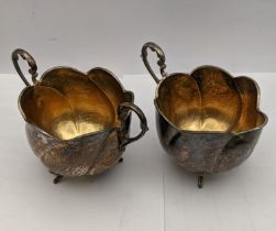 A Middle Eastern silver sugar bowl and cream jug stamped 925 Israel, total weight 173.6g Location:
