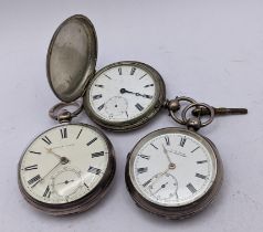 Three late 19th/early 20th century open faced cased silver pocket watches with enamelled dials