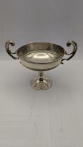 A silver twin handle silver cup hallmarked London 1906, total weight 108g Location:
