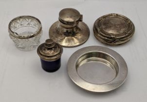 Silver to include a caption inkwell, a dish, a lid, a glass salt and a blue glass and silver