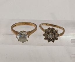 Two 9ct gold rings set with paste clear stones, 5.9g Location:
