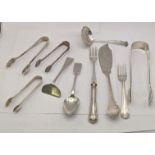 Silver o include four sugar tongs, a sifter spoon, fork, spoon a pusher and a silver handled