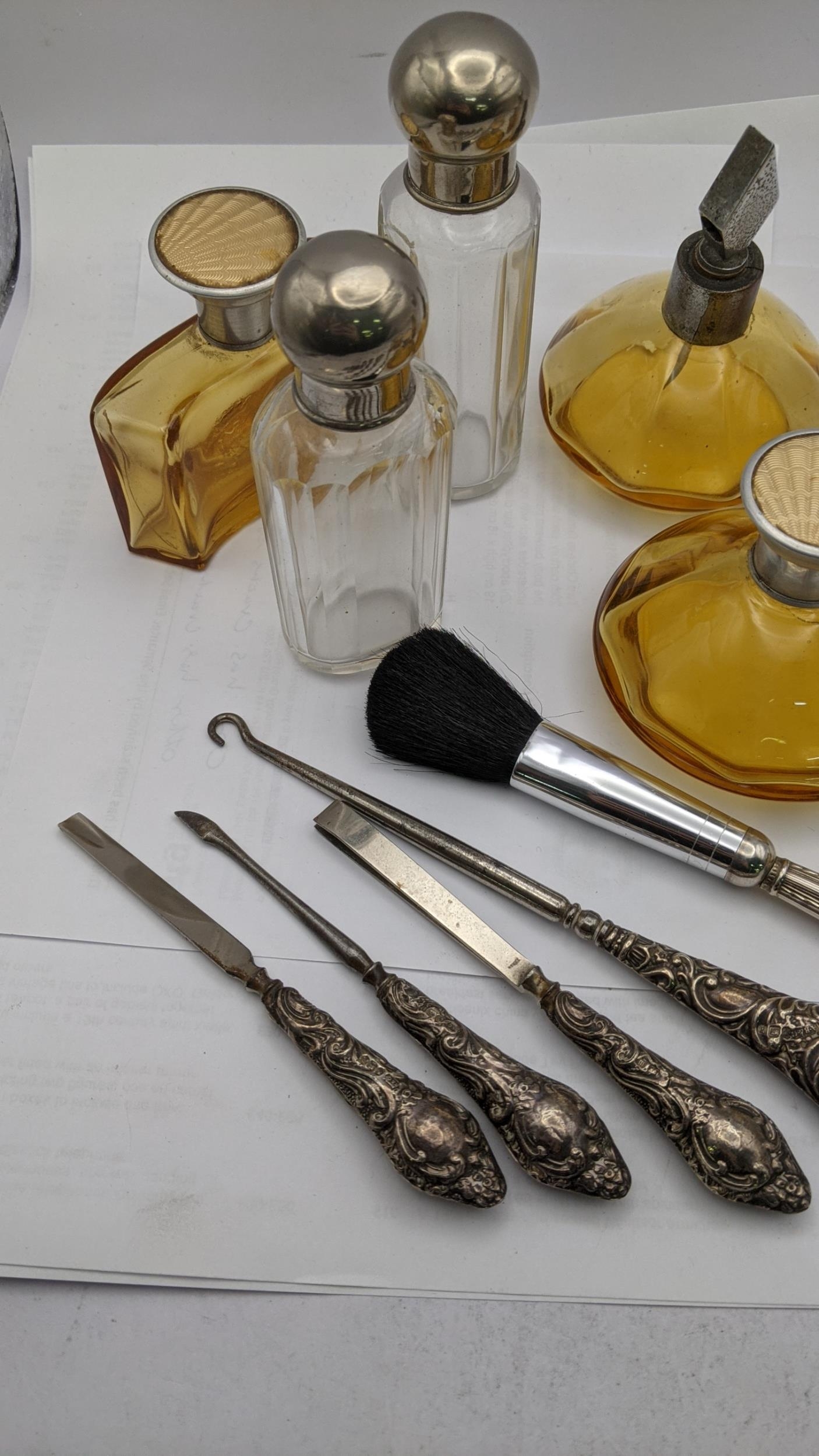 Dressing table items to include brown glass bottles with engine turned lids, silver handled manicure - Image 2 of 4