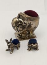 Three silver pin cushions fashioned as an elephant, a frog and a rabbit, total weight 51.2g