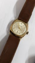 A mid 20th century Kered 9ct gold manual wind wristwatch on a brown leather strap Location: