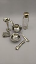 Mixed silver and white metal to include an embossed trinket box, miniature vase, tea strainer, a