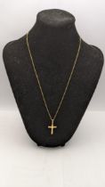 A 14ct gold cross pendant on a 14ct necklace, total weight 3.6g Location: