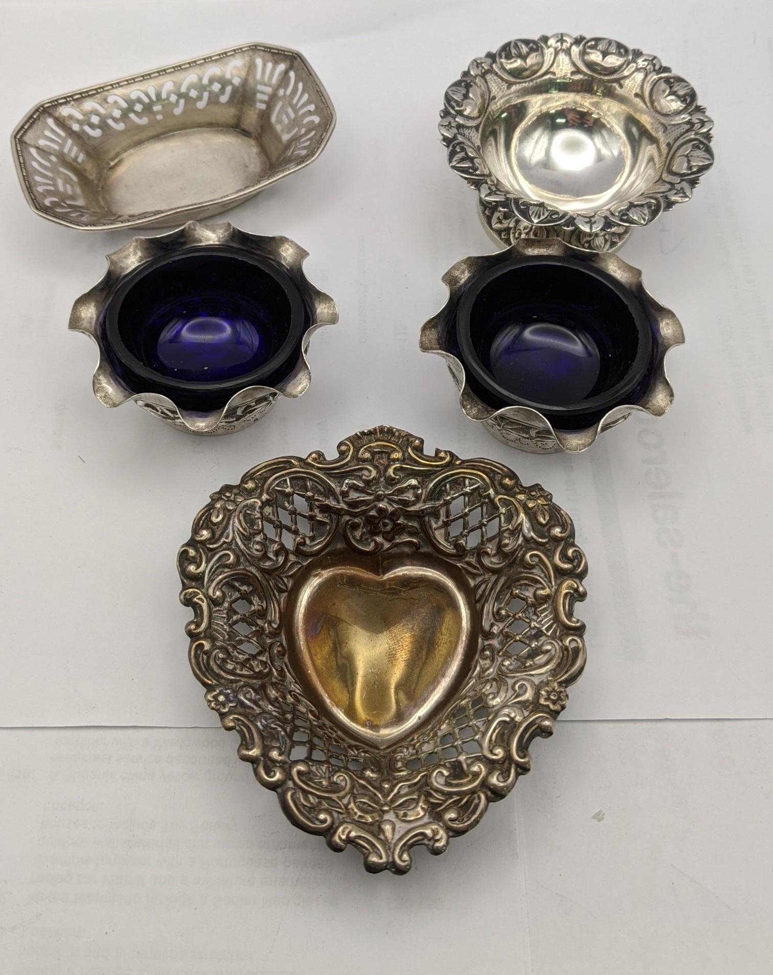 Silver to include a pair of Indian salts and three bon bon dishes, total weight 119.8g Location: