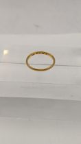 A 22ct gold ladies wedding band 1.5g Location: