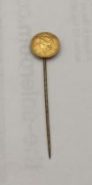 USA - A late 19th century Liberty head dollar mounted on a stick pin Location: