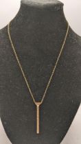 A yellow metal drop pendant on a 9ct gold necklace 7.6g Location: